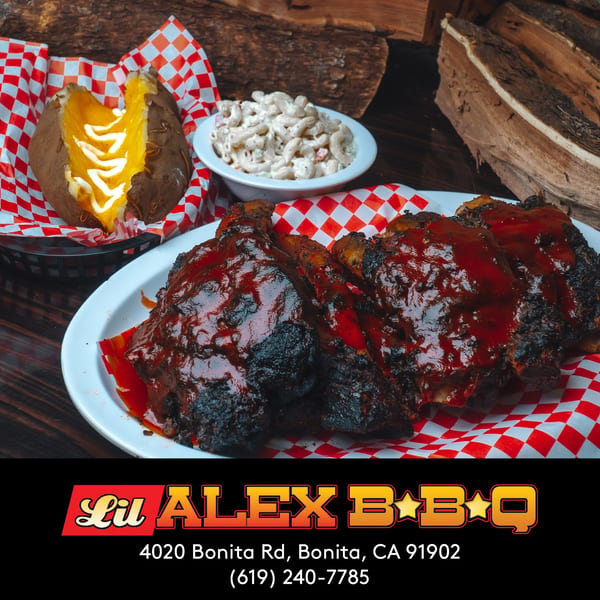 Lil Alex BBQ ribs with sauce, baked potato with butter, and macaroni salad.
