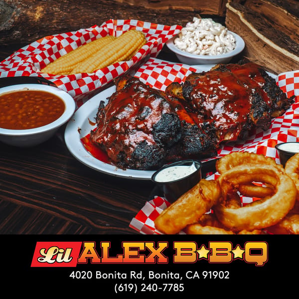 Lil Alex BBQ ribs, baked beans, corn on the cob, macaroni salad, and onion rings.